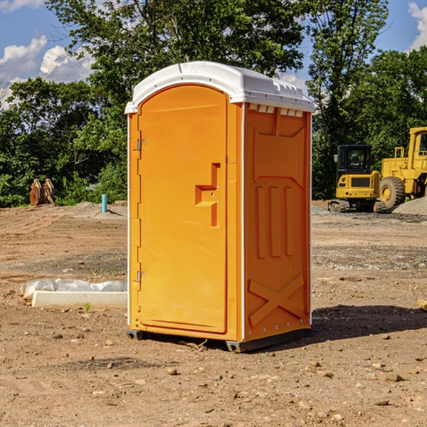 how often are the portable restrooms cleaned and serviced during a rental period in Lachine